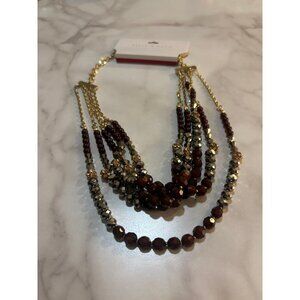 A multi-strand beaded statement necklace by Kelly & Katie.